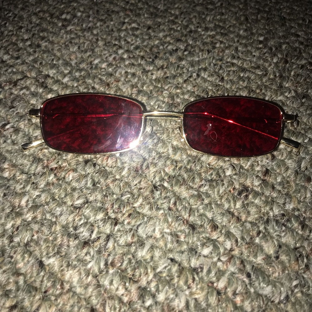 Red tinted rectangle glasses